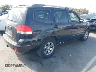 2009 Kia Borrego LX with VIN KNDJJ741095039023, listed as a IAAI auction lot 41696562 with 239,921 mi miles. Bid and sale history available at carsss.com. Image 4.