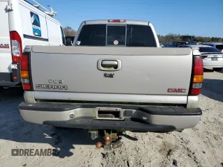 2005 GMC Sierra Denali z VIN 2GTEK63N551145668, wystawiony jako Copart lot #50544675 z przebiegiem Nie podano mil oraz Tytuł czysty. Historia ofert i sprzedaży dostępna na DreamBid. Obrazek 6.