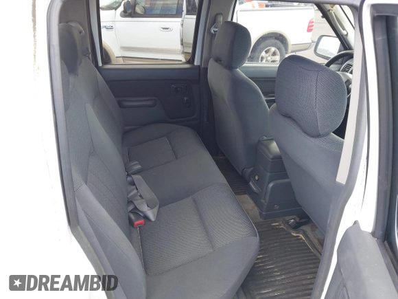 2004 Nissan Frontier XE z VIN 1N6ED29X54C475425, wystawiony jako IAAI lot #42292779 z przebiegiem 156 000 mil mil oraz . Historia ofert i sprzedaży dostępna na DreamBid. Obrazek 8.