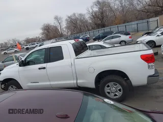 2012 Toyota Tundra z VIN 5TFUM5F11CX039386, wystawiony jako IAAI lot #41472576 z przebiegiem 213 295 mil mil oraz . Historia ofert i sprzedaży dostępna na DreamBid. Obrazek 15.