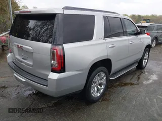 2015 GMC Yukon SLT with VIN 1GKS2BKC0FR676107, listed as a IAAI auction lot 41962929 with 132,389 mi miles. Bid and sale history available at carsss.com. Image 4.