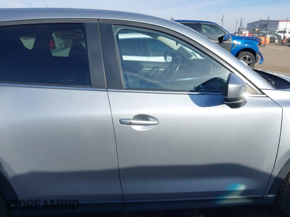 2020 Mazda CX-5 Touring with VIN JM3KFACM1L0789394, listed as a IAAI auction lot 41565887 with 73,730 mi miles. Bid and sale history available at carsss.com. Image 14.
