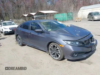 2020 Honda Civic Sedan Sport with VIN 2HGFC2F81LH511700, listed as a IAAI auction lot 41876533 with 79,610 mi miles. Bid and sale history available at carsss.com. Image 1.