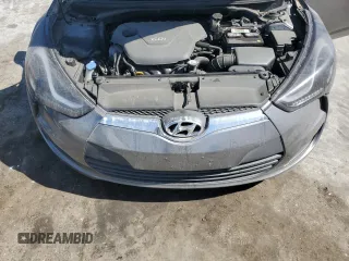 2012 Hyundai Veloster w/Black Int z VIN KMHTC6AD4CU046609, wystawiony jako Copart lot #54888045 z przebiegiem 152 997 mil mil oraz Szkoda całkowita • Salvage title. Historia ofert i sprzedaży dostępna na DreamBid. Obrazek 11.