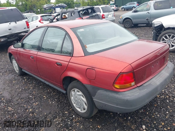 1997 Saturn SL with VIN 1G8ZF5289VZ138039, listed as a IAAI auction lot 39432871 with 125,022 mi miles. Bid and sale history available at carsss.com. Image 3.