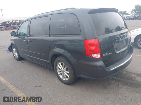 2014 Dodge Grand Caravan SXT z VIN 2C4RDGCG6ER206045, wystawiony jako IAAI lot #42289138 z przebiegiem 124 962 mil mil oraz . Historia ofert i sprzedaży dostępna na DreamBid. Obrazek 3.