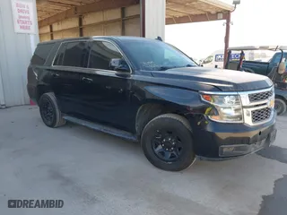 2018 Chevrolet Tahoe Commercial with VIN 1GNSKDEC8JR351269, listed as a IAAI auction lot 41602443 with 79,970 mi miles. Bid and sale history available at carsss.com. Image 1.