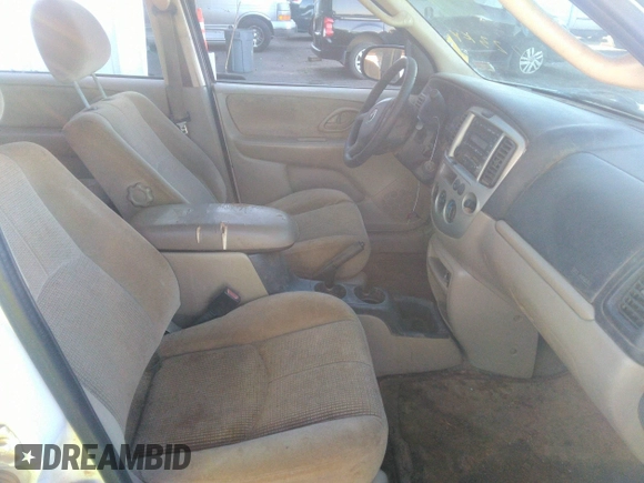 2003 Mazda Tribute LX with VIN 4F2YZ04153KM18168, listed as a IAAI auction lot 39240269 with 225,859 mi miles and . Bid and sale history available at DreamBid. Image 5.