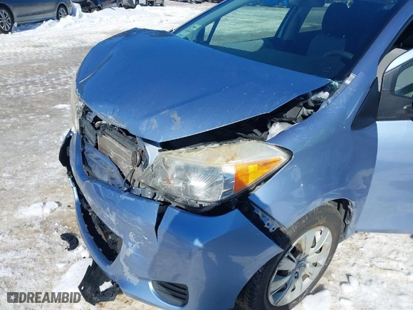 2012 Toyota Yaris L with VIN JTDKTUD39CD519198, listed as a IAAI auction lot 41589349 with 100,046 mi miles. Bid and sale history available at carsss.com. Image 6.