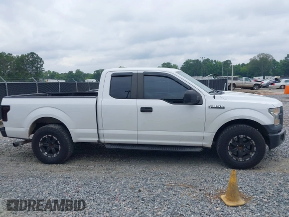 2015 Ford F-150 XL with VIN 1FTEX1C8XFFA75822, listed as a IAAI auction lot 42430498 with 197,181 mi miles and . Bid and sale history available at DreamBid. Image 13.