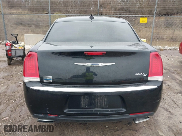 2016 Chrysler 300 with VIN 2C3CCAEG0GH348651, listed as a IAAI auction lot 41967981 with 141,728 mi miles. Bid and sale history available at carsss.com. Image 16.