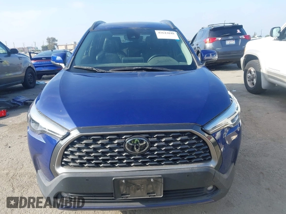2022 Toyota Corolla Cross XLE with VIN 7MUDAAAG7NV024323, listed as a IAAI auction lot 42643048 with 76,465 mi miles and . Bid and sale history available at DreamBid. Image 13.