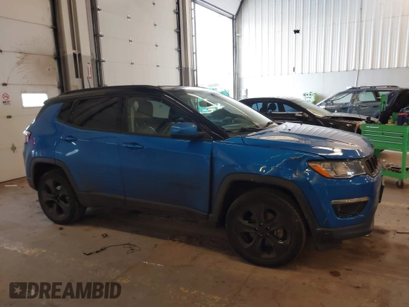 2019 Jeep Compass Latitude with VIN 3C4NJDBB7KT741048, listed as a IAAI auction lot 41597839 with 59,431 mi miles and . Bid and sale history available at DreamBid. Image 13.