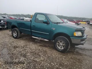 1998 Ford F-150 with VIN 1FTZF18W8WKA89592, listed as a Copart auction lot 65345104 with 166,758 mi miles and Salvage title. Bid and sale history available at DreamBid. Image 4.
