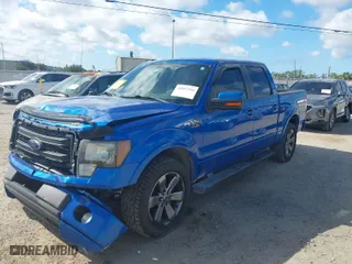 2013 Ford F-150 XL with VIN 1FTFW1CF2DFD94327, listed as a IAAI auction lot 41817344 with 292,491 mi miles. Bid and sale history available at carsss.com. Image 2.