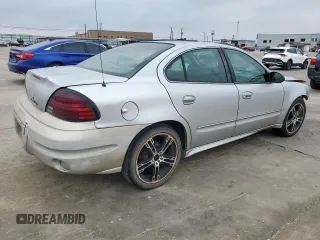 2003 Pontiac Grand Am SE1 z VIN 1G2NF52F53C110665, wystawiony jako Copart lot #57164865 z przebiegiem 206 086 mil mil oraz Szkody całkowita. Historia ofert i sprzedaży dostępna na DreamBid. Obrazek 3.