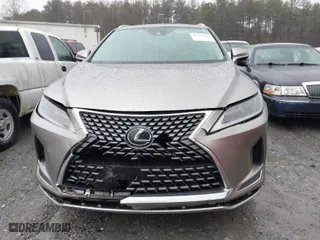 2021 Lexus RX with VIN 2T2HZMAA0MC191675, listed as a IAAI auction lot 41565196 with 67,490 mi miles. Bid and sale history available at carsss.com. Image 12.