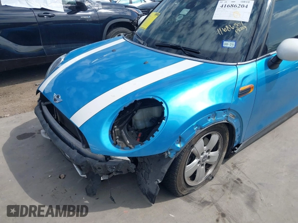 2017 MINI Hardtop 4 Door Cooper with VIN WMWXU1C53H2E17614, listed as a IAAI auction lot 41686204 with 53,409 mi miles and . Bid and sale history available at DreamBid. Image 6.