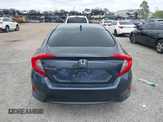 2018 Honda Civic EX with VIN 19XFC2F75JE035935, listed as a IAAI auction lot 41795110 with 92,687 mi miles and . Bid and sale history available at DreamBid. Image 17.