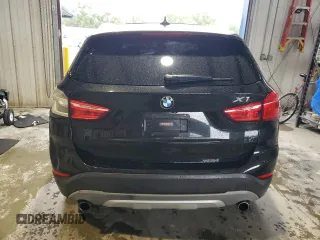 2017 BMW X1 xDrive28i z VIN WBXHT3Z39H4A57395, wystawiony jako Copart lot #56357845 z przebiegiem Nie podano mil oraz Szkody całkowita. Historia ofert i sprzedaży dostępna na DreamBid. Obrazek 6.