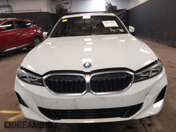 2023 BMW 3 Series 330e xDrive with VIN 3MW39FS05P8D20575, listed as a IAAI auction lot 42076033 with 10,875 mi miles. Bid and sale history available at carsss.com. Image 12.