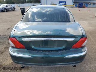 2004 Jaguar X-Type with VIN SAJEA51C34WE19153, listed as a Copart auction lot 77452474 with 0 mi miles and Salvage Title. Bid and sale history available at carsss.com. Image 6.