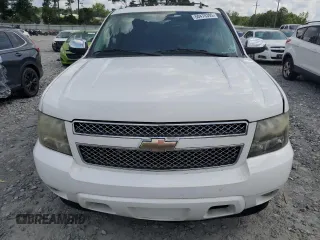 2011 Chevrolet Tahoe LS with VIN 1GNSCAE08BR394917, listed as a Copart auction lot 60470395 with 143,824 mi miles and Salvage title. Bid and sale history available at DreamBid. Image 5.
