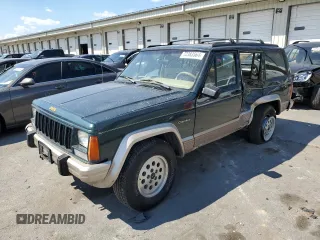 1993 Jeep Cherokee Country with VIN 1J4FJ78S4PL517648, listed as a Copart auction lot 72383564 with 127,156 mi miles and Salvage Title. Bid and sale history available at carsss.com. Image 1.
