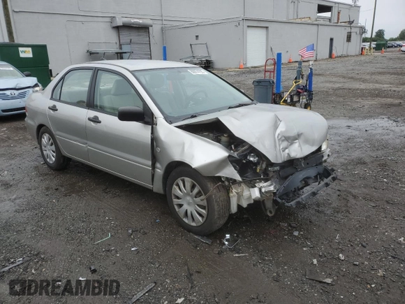 2006 Mitsubishi Lancer ES with VIN JA3AJ26E66U008538, listed as a Copart auction lot 60974795 with 121,211 mi miles and Salvage title. Bid and sale history available at DreamBid. Image 4.