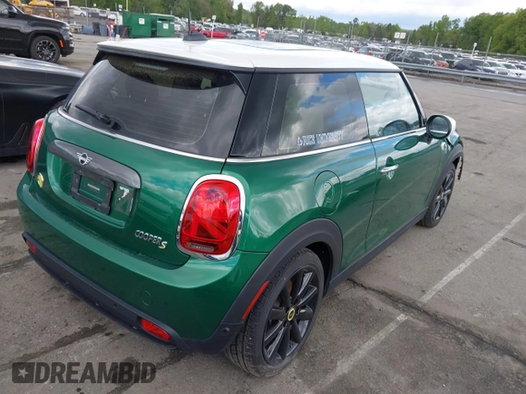 2021 MINI Hardtop Cooper SE with VIN WMWXP3C06M2N26986, listed as a IAAI auction lot 42023528 with 39,068 mi miles and . Bid and sale history available at DreamBid. Image 4.