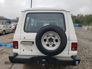 1990 Mitsubishi Montero z VIN JA4GJ31S2LJ003083, wystawiony jako Copart lot #73539314 z przebiegiem 115 191 mil mil oraz Nie do naprawy • Non repairable. Historia ofert i sprzedaży dostępna na DreamBid. Obrazek 6.