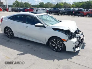 2018 Honda Civic Si with VIN 2HGFC1E53JH700251, listed as a IAAI auction lot 42043732 with 104,763 mi miles and . Bid and sale history available at DreamBid. Image 1.