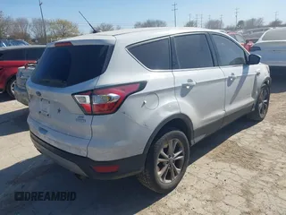 2017 Ford Escape SE with VIN 1FMCU0G90HUD85582, listed as a IAAI auction lot 41733013 with 129,961 mi miles and . Bid and sale history available at DreamBid. Image 4.