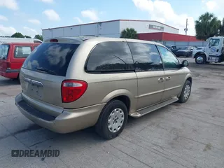 2002 Chrysler Town & Country with VIN 2C8GP44322R584429, listed as a IAAI auction lot 41938367 with Not Provided miles and . Bid and sale history available at DreamBid. Image 4.
