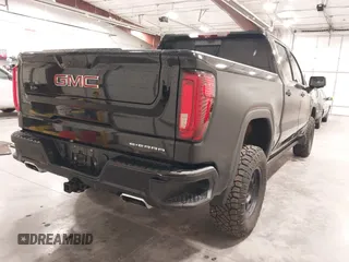 2020 GMC Sierra 1500 Denali with VIN 1GTU9FEL8LZ176453, listed as a IAAI auction lot 42194497 with 64,932 mi miles and . Bid and sale history available at DreamBid. Image 4.