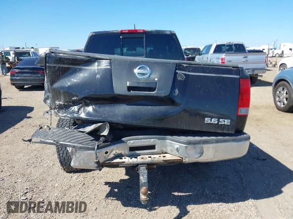 2005 Nissan Titan XE with VIN 1N6BA06A15N560400, listed as a IAAI auction lot 41656560 with 212,568 mi miles. Bid and sale history available at carsss.com. Image 16.