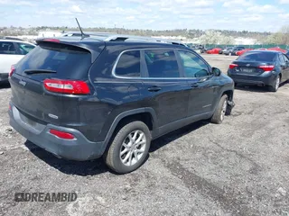 2014 Jeep Cherokee Latitude with VIN 1C4PJMCS8EW257959, listed as a IAAI auction lot 41987529 with 124,749 mi miles. Bid and sale history available at carsss.com. Image 4.