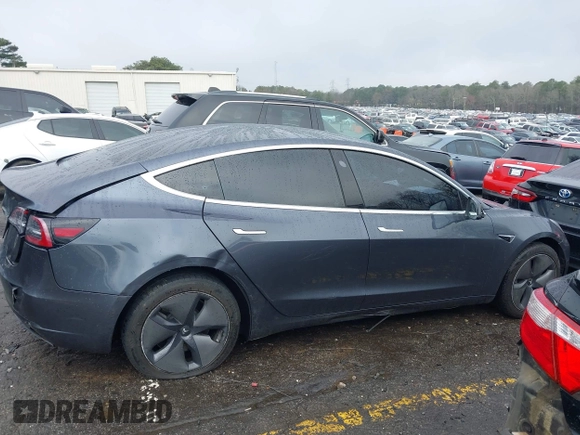 2019 Tesla Model 3 Mid Range with VIN 5YJ3E1EA3KF426971, listed as a IAAI auction lot 41564939 with Not Provided miles and . Bid and sale history available at carsss.com. Image 13.