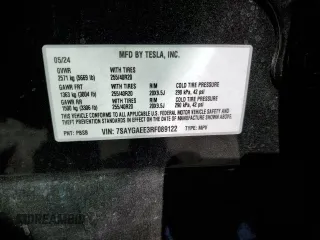 2024 Tesla Model Y Long Range z VIN 7SAYGAEE3RF089122, wystawiony jako Copart lot #52732035 z przebiegiem 15 486 mil mil oraz Szkoda całkowita • Salvage title. Historia ofert i sprzedaży dostępna na DreamBid. Obrazek 13.