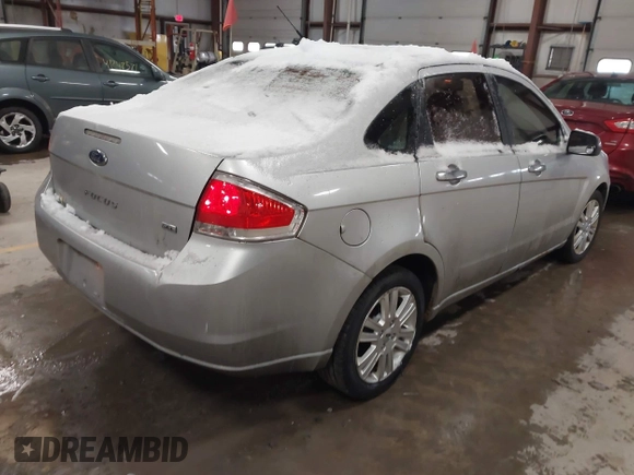 2010 Ford Focus SEL with VIN 1FAHP3HN8AW122237, listed as a IAAI auction lot 41203994 with 117,440 mi miles. Bid and sale history available at carsss.com. Image 4.