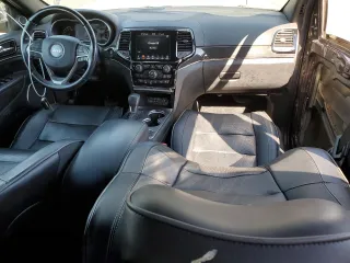 2019 Jeep Grand Cherokee Overland with VIN 1C4RJFCT7KC833390, listed as a Copart auction lot 74015774 with 64,598 mi miles and Salvage Title. Bid and sale history available at carsss.com. Image 8.