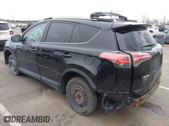 2016 Toyota RAV4 LE with VIN 2T3BFREV3GW447802, listed as a IAAI auction lot 41985438 with 213,247 mi miles. Bid and sale history available at carsss.com. Image 3.