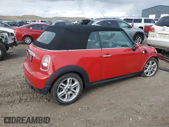 2012 MINI Convertible с VIN WMWZN3C56CT135341, выставлен на аукционе Copart как лот 48611575 с пробегом Не указан миль и Списание • Salvage title. История ставок и продаж доступна на DreamBid. Изображение 3.