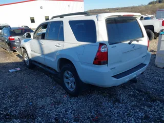 2006 Toyota 4Runner SR5 with VIN JTEBU14R560098877, listed as a IAAI auction lot 41722880 with 212,357 mi miles. Bid and sale history available at carsss.com. Image 3.