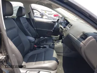 2015 Volkswagen Jetta SE z VIN 3VWD07AJ1FM284890, wystawiony jako IAAI lot #42328592 z przebiegiem 92 880 mil mil oraz . Historia ofert i sprzedaży dostępna na DreamBid. Obrazek 5.