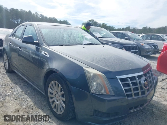 2012 Cadillac CTS Luxury with VIN 1G6DE5E58C0143175, listed as a IAAI auction lot 41612743 with 148,764 mi miles and . Bid and sale history available at DreamBid. Image 1.