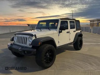 2018 Jeep Wrangler JK Unlimited Sport S with VIN 1C4BJWDG3JL805961, listed as a Copart auction lot 42876675 with 58,839 mi miles and Salvage Title. Bid and sale history available at carsss.com. Image 2.