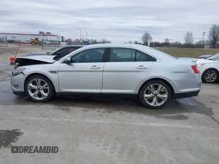 2012 Ford Taurus SHO z VIN 1FAHP2KT6CG142954, wystawiony jako IAAI lot #41526760 z przebiegiem 187 887 mil mil oraz . Historia ofert i sprzedaży dostępna na DreamBid. Obrazek 14.