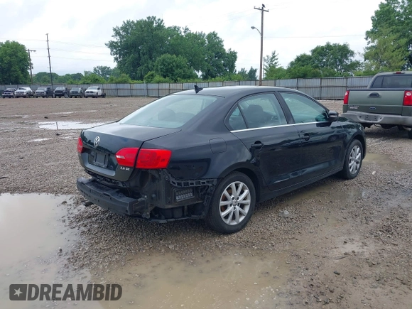2013 Volkswagen Jetta SE with VIN 3VWDX7AJ1DM352551, listed as a IAAI auction lot 42473476 with 95,612 mi miles and . Bid and sale history available at DreamBid. Image 4.