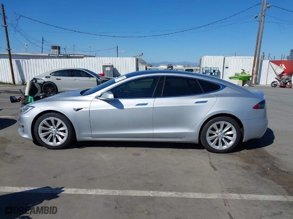 2016 Tesla Model S 70 kWh Battery with VIN 5YJSA1E17GF171143, listed as a IAAI auction lot 41707192 with NaN miles. Bid and sale history available at carsss.com. Image 13.